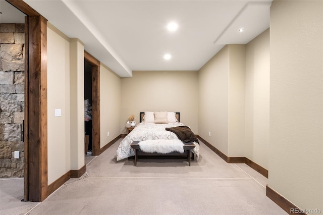 bedroom with baseboards and carpet floors