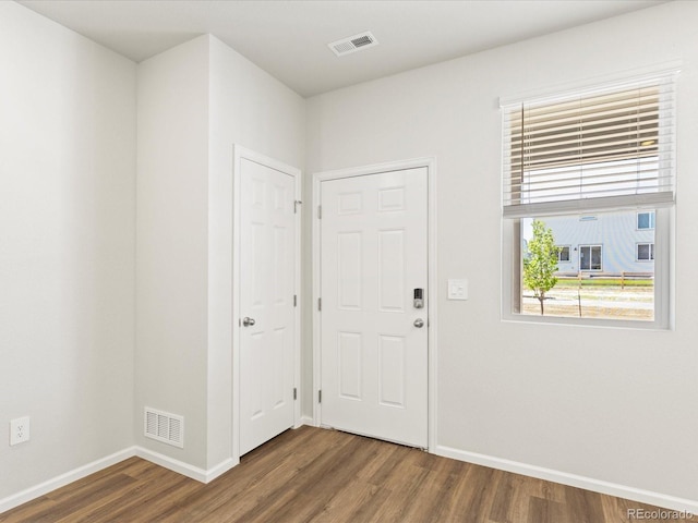1618 Riverplace Dr Unit 2, Windsor, CO 80550 - foyer featuring wood finished floors and baseboards