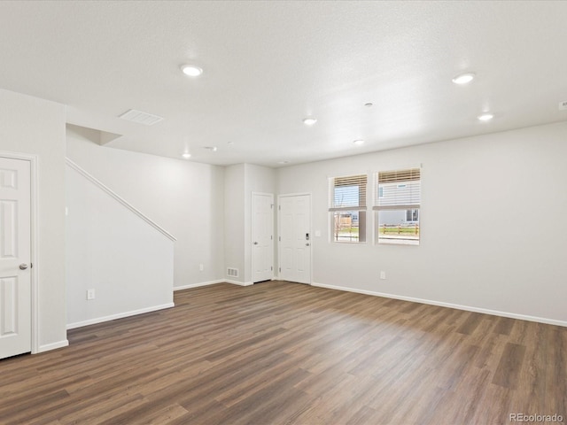 1618 Riverplace Dr Unit 2, Windsor, CO 80550 - empty room with wood finished floors, recessed lighting, and baseboards