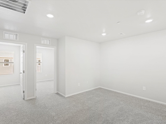 1618 Riverplace Dr Unit 2, Windsor, CO 80550 - spare room with carpet floors, baseboards, and recessed lighting