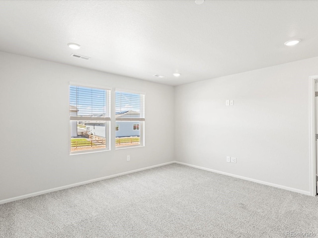1618 Riverplace Dr Unit 2, Windsor, CO 80550 - unfurnished room featuring carpet flooring, baseboards, and recessed lighting
