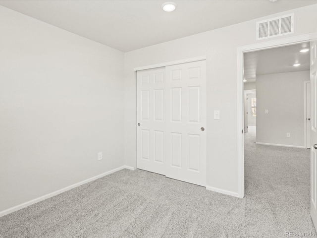 1618 Riverplace Dr Unit 2, Windsor, CO 80550 - unfurnished bedroom with carpet floors, baseboards, and a closet