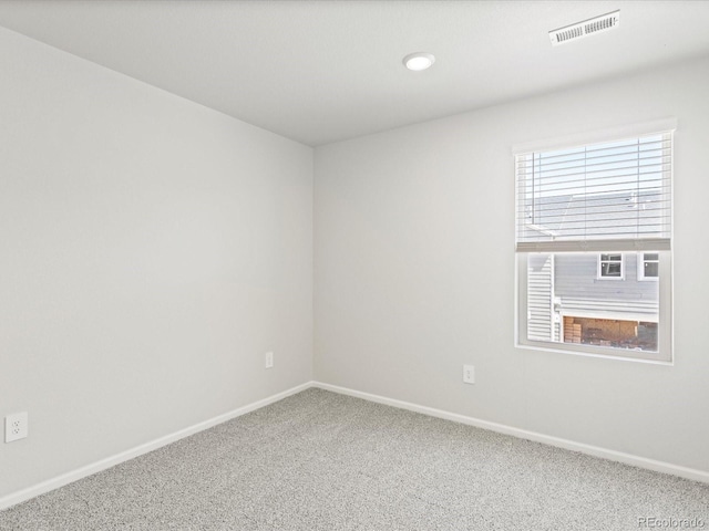 1618 Riverplace Dr Unit 2, Windsor, CO 80550 - spare room featuring carpet flooring, baseboards, and recessed lighting