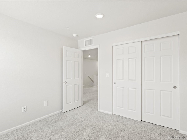 1618 Riverplace Dr Unit 2, Windsor, CO 80550 - unfurnished bedroom with carpet floors, baseboards, and a closet