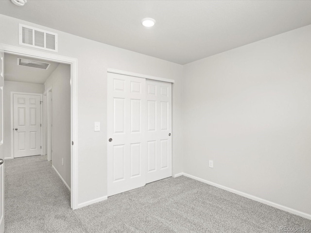 1618 Riverplace Dr Unit 2, Windsor, CO 80550 - unfurnished bedroom featuring carpet flooring, baseboards, and a closet
