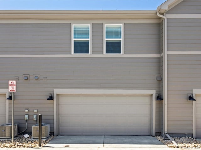 1618 Riverplace Dr Unit 2, Windsor, CO 80550 - garage featuring central AC and driveway