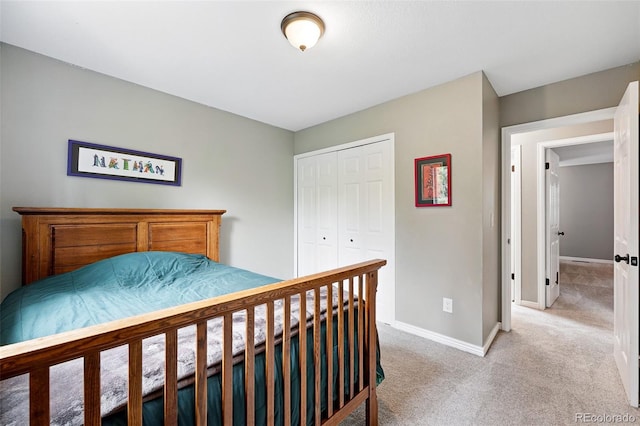 6248 E Mineral Pl, Centennial, CO 80112 - bedroom featuring light carpet, baseboards, and a closet