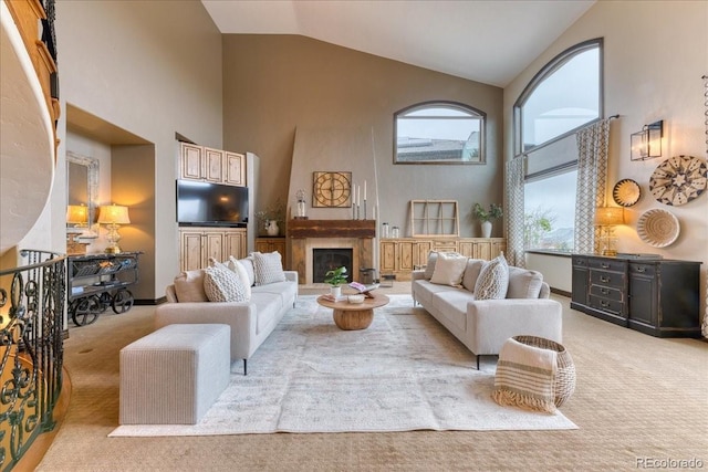 16713 W Archer Ave, Golden, CO 80401 - carpeted living area with high vaulted ceiling and a fireplace