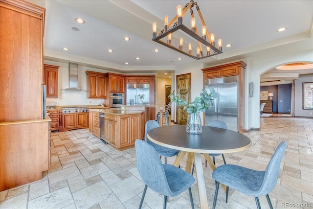 16713 W Archer Ave, Golden, CO 80401 - dining room featuring arched walkways, recessed lighting, and stone tile flooring