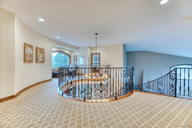 16713 W Archer Ave, Golden, CO 80401 - hallway with an upstairs landing, carpet floors, baseboards, recessed lighting, and vaulted ceiling
