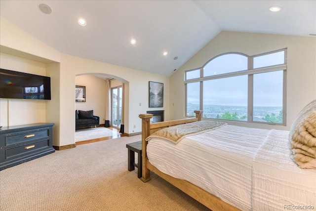 16713 W Archer Ave, Golden, CO 80401 - bedroom with arched walkways, lofted ceiling, carpet, recessed lighting, and baseboards
