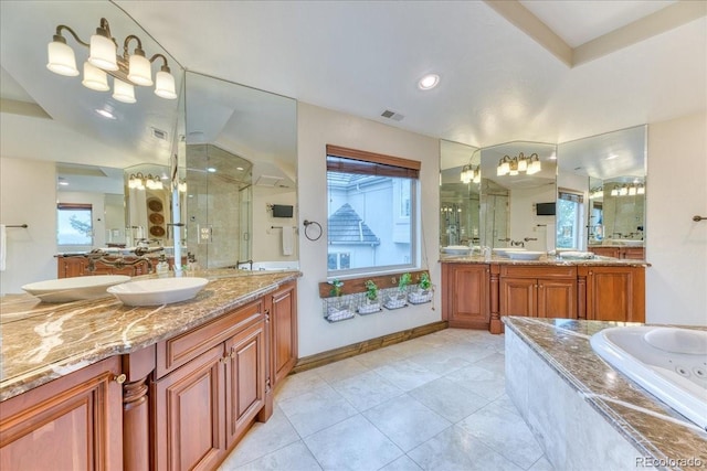 16713 W Archer Ave, Golden, CO 80401 - bathroom with a shower stall, tile patterned flooring, a chandelier, a tub with jets, and healthy amount of natural light