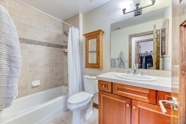 16713 W Archer Ave, Golden, CO 80401 - full bathroom featuring tile patterned flooring, toilet, shower / bath combo, and vanity