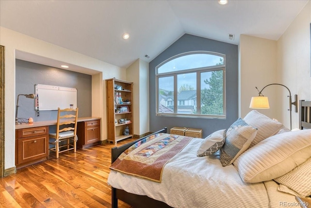 16713 W Archer Ave, Golden, CO 80401 - bedroom with light wood-style flooring, vaulted ceiling, and recessed lighting