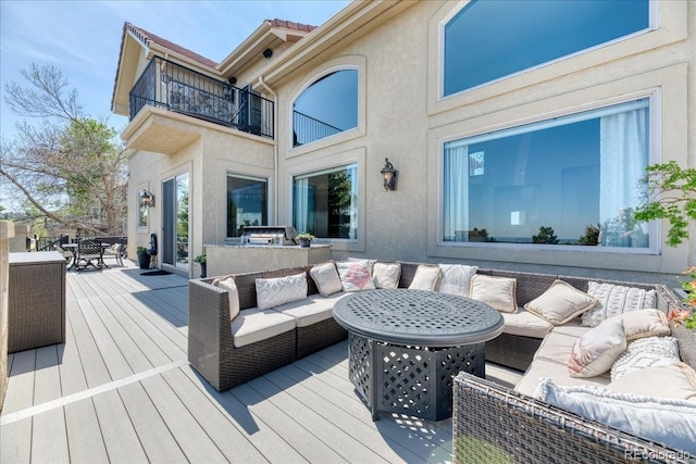16713 W Archer Ave, Golden, CO 80401 - wooden deck with an outdoor living space and outdoor dining space