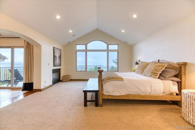 16713 W Archer Ave, Golden, CO 80401 - bedroom with multiple windows, access to exterior, light colored carpet, vaulted ceiling, and recessed lighting