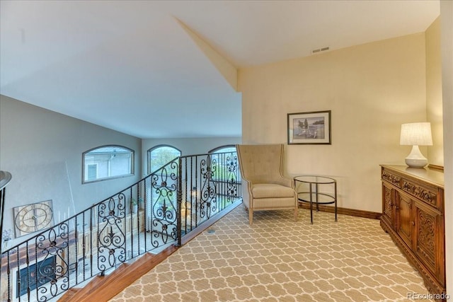 16713 W Archer Ave, Golden, CO 80401 - living area featuring baseboards and an upstairs landing
