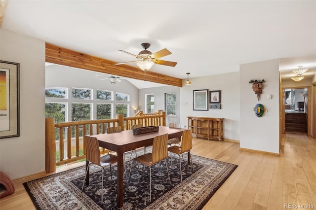 dining room with vaulted ceiling with beams, ceiling fan, and light hardwood / wood-style flooring