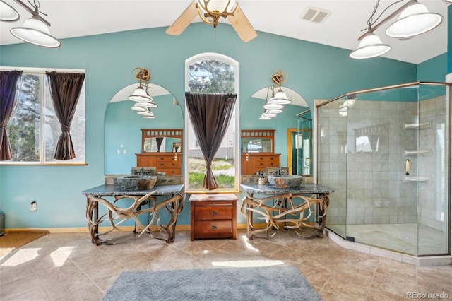 bathroom featuring tile floors, a shower with door, vanity, and ceiling fan