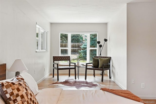 7035 S Gray Ct, Littleton, CO 80128 - living area featuring wood finished floors and baseboards