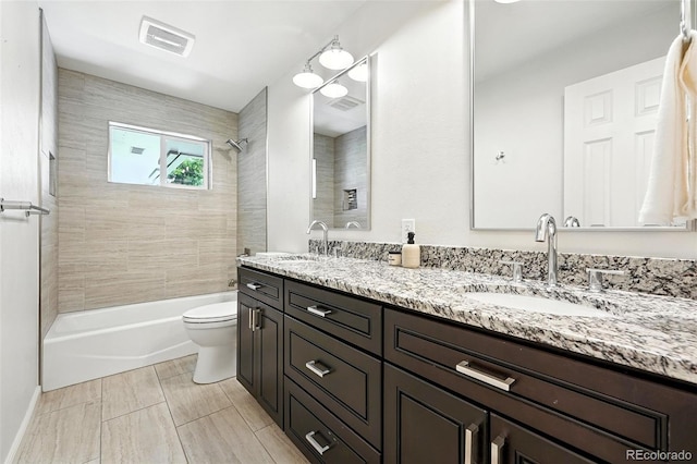 7035 S Gray Ct, Littleton, CO 80128 - full bath with double vanity and shower / bathtub combination