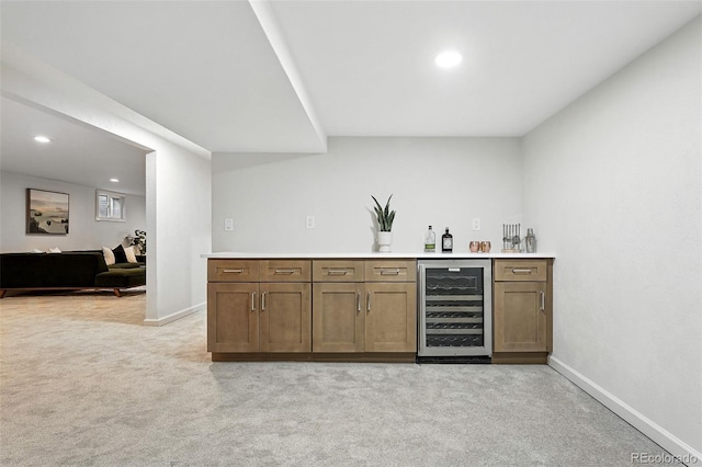 7035 S Gray Ct, Littleton, CO 80128 - indoor wet bar featuring wine cooler, light carpet, and recessed lighting