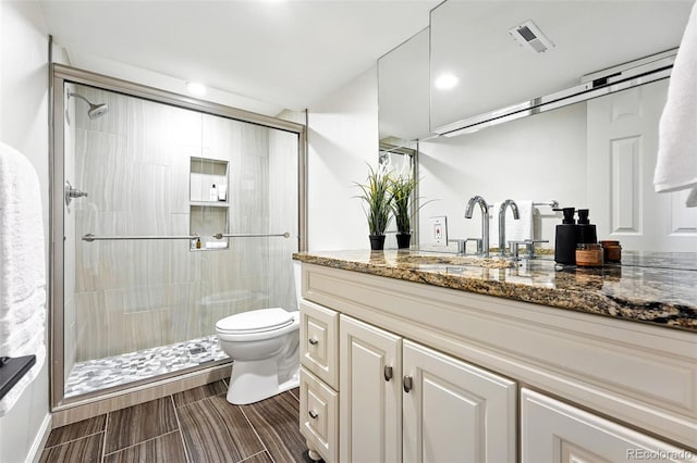 7035 S Gray Ct, Littleton, CO 80128 - bathroom featuring vanity and a stall shower