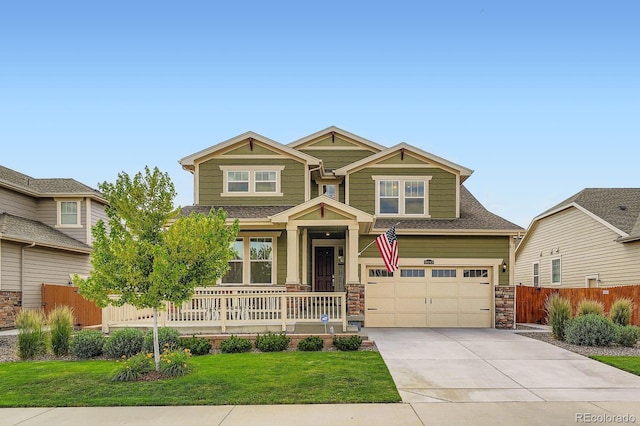 16043 Fillmore St, Thornton, CO 80602 - craftsman inspired home featuring concrete driveway, a porch, stone siding, an attached garage, and roof with shingles