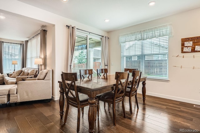 16043 Fillmore St, Thornton, CO 80602 - dining area featuring healthy amount of natural light, dark wood finished floors, and recessed lighting