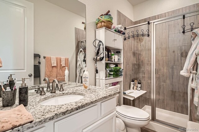 16043 Fillmore St, Thornton, CO 80602 - full bathroom featuring vanity and a stall shower
