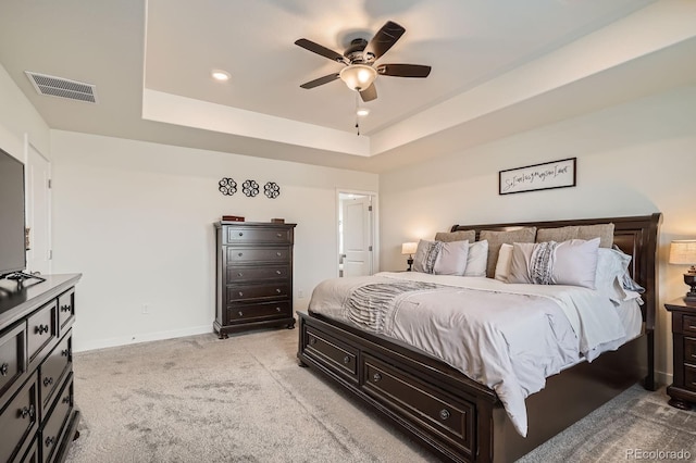 16043 Fillmore St, Thornton, CO 80602 - bedroom featuring a tray ceiling, light colored carpet, recessed lighting, and a ceiling fan
