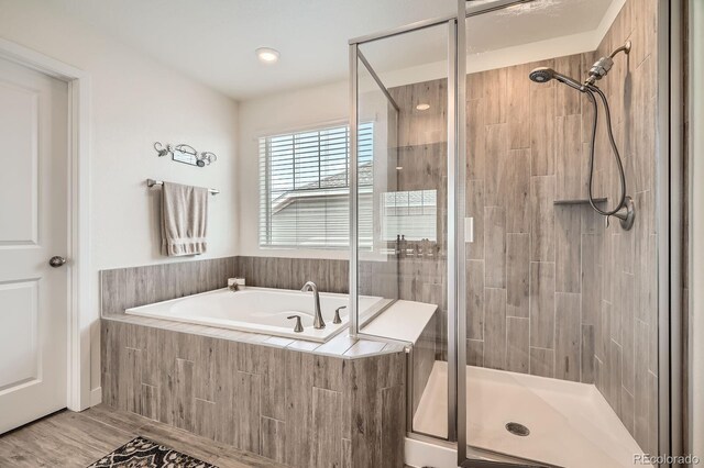 16043 Fillmore St, Thornton, CO 80602 - bathroom featuring a stall shower and a bath
