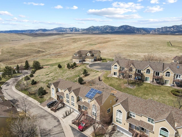 aerial view featuring a residential view and a mountain view