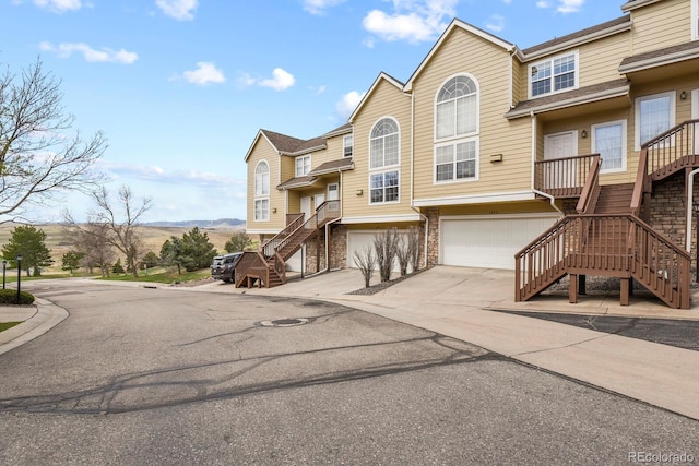 exterior space with stairs and a mountain view