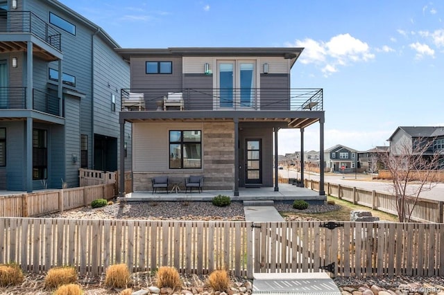 modern home featuring a balcony