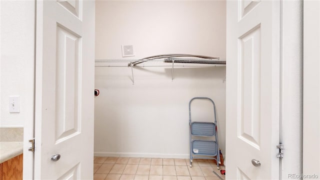 interior space with light tile patterned floors