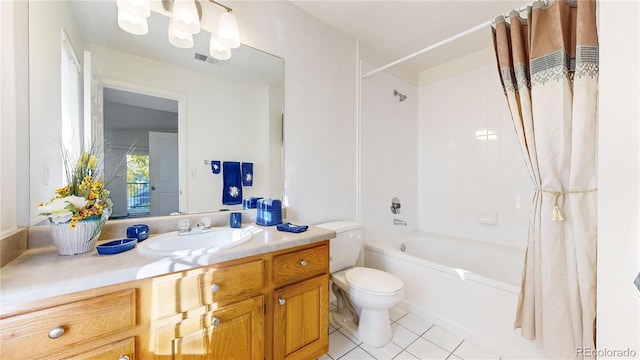 full bathroom with vanity, shower / bath combo with shower curtain, toilet, and tile patterned floors