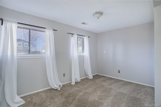 view of carpeted spare room