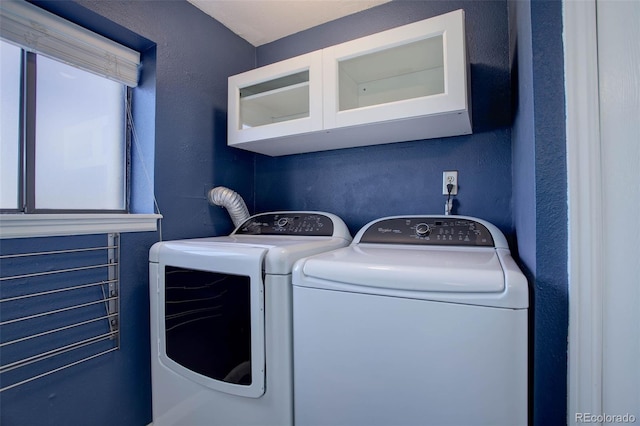 laundry area with washing machine and dryer