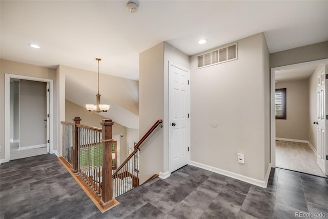 17522 E Dewberry Dr, Parker, CO 80134 - foyer entrance with a chandelier, baseboards, and recessed lighting