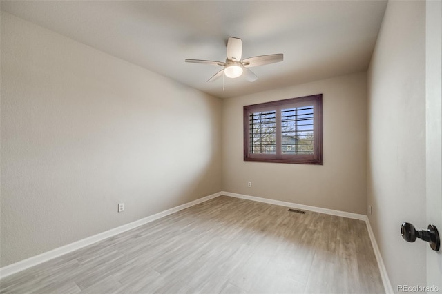 17522 E Dewberry Dr, Parker, CO 80134 - unfurnished room featuring light wood-style flooring, ceiling fan, and baseboards
