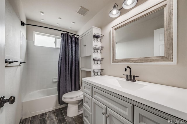 17522 E Dewberry Dr, Parker, CO 80134 - full bath with toilet, wood tiled floors, vanity, and shower / tub combo