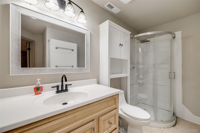 17522 E Dewberry Dr, Parker, CO 80134 - bathroom with a stall shower, vanity, toilet, and speckle patterned floor