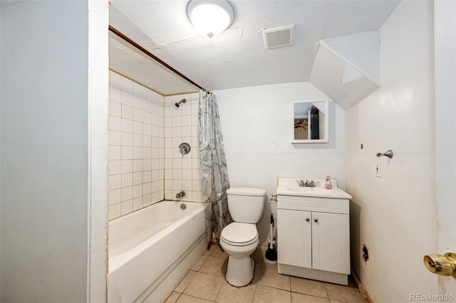 full bathroom with vanity, toilet, shower / bath combo with shower curtain, and tile patterned flooring