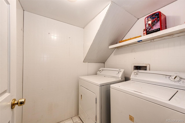 laundry room featuring washing machine and dryer