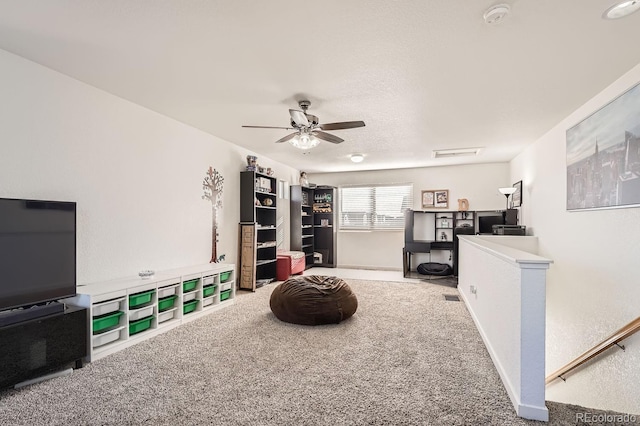 interior space with ceiling fan