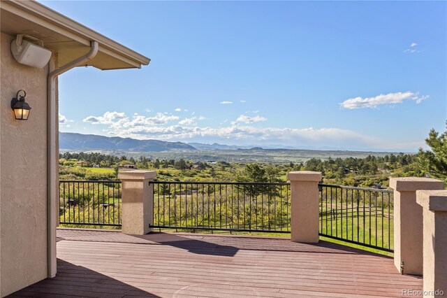 3485 Park Ridge Rd, Sedalia, CO 80135 - wooden terrace with a mountain view