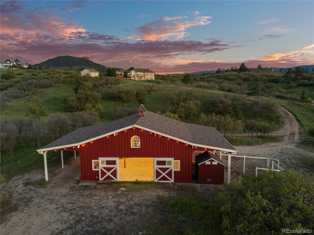 3485 Park Ridge Rd, Sedalia, CO 80135 - view of barn with a mountain view and a view of countryside