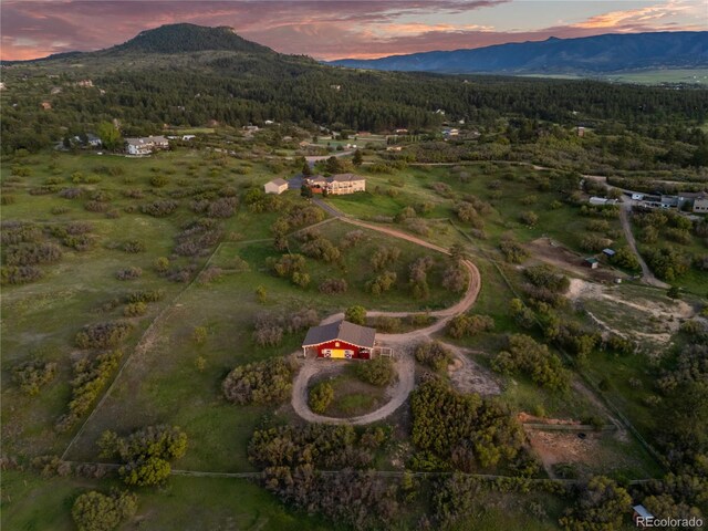 3485 Park Ridge Rd, Sedalia, CO 80135 - view of property location with a mountain backdrop and a forest