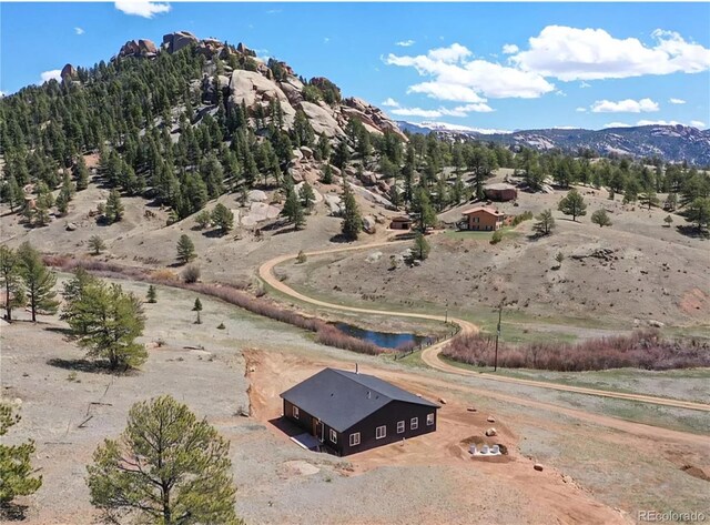 45 Saltlick Cir, Florissant, CO 80816 - drone / aerial view with a rural view and a mountain view